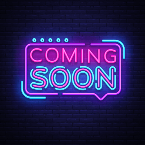 A pink and blue neon sign with the words 'Coming Soon' on a black background